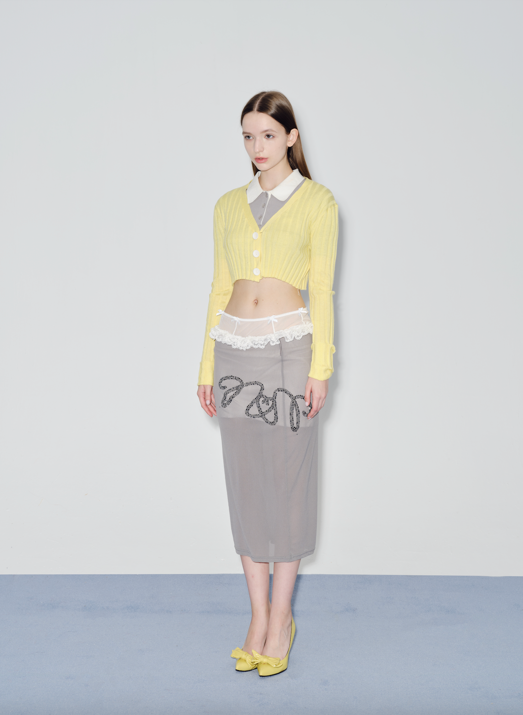 Yellow knitted cardigan