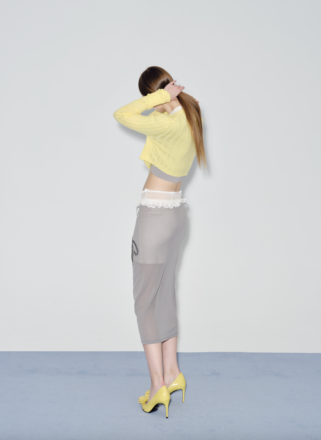 Yellow knitted cardigan